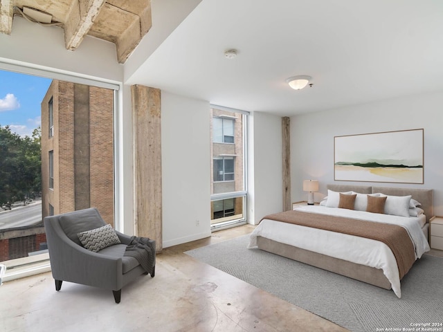 1115 S Alamo St Unit 2310, San Antonio, TX 78210 - bedroom with concrete flooring