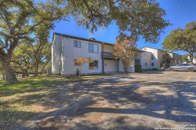 view of front of home with central AC unit