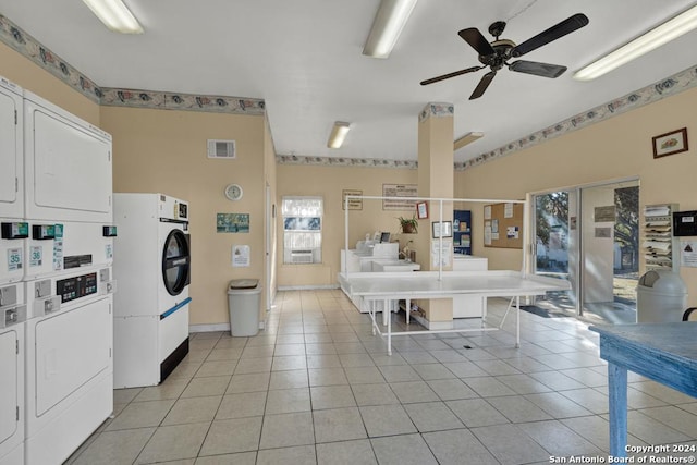 kitchen with light tile patterned floors, separate washer and dryer, white cabinetry, and ceiling fan