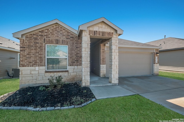 single story home with a garage and cooling unit