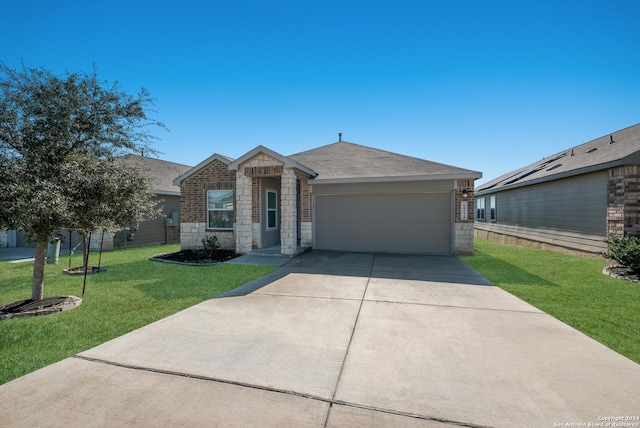 single story home featuring a front yard and a garage