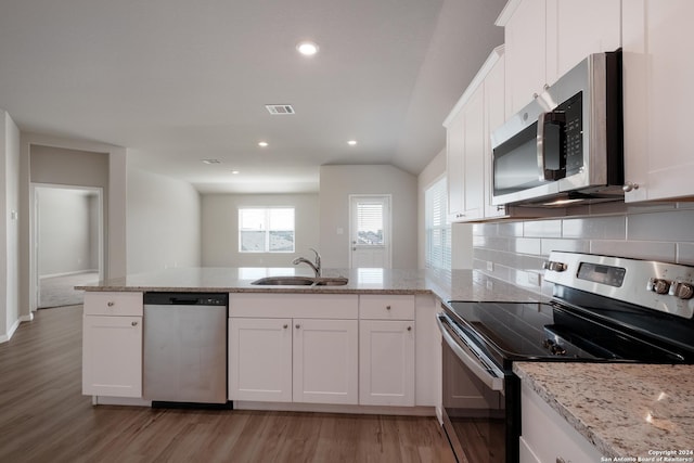 kitchen featuring white cabinets and stainless steel appliances