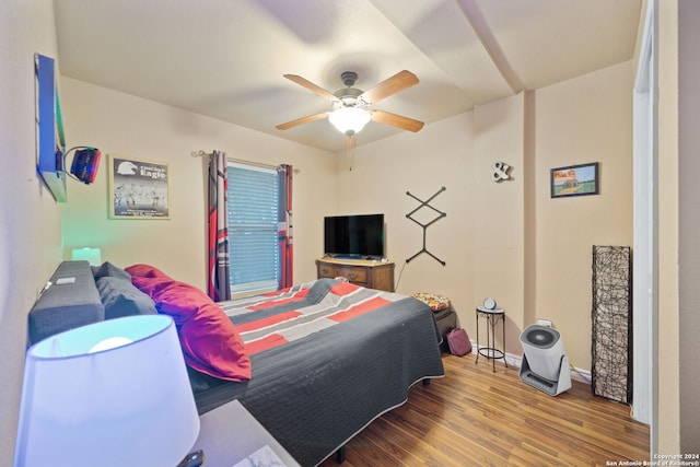 bedroom featuring ceiling fan and hardwood / wood-style flooring