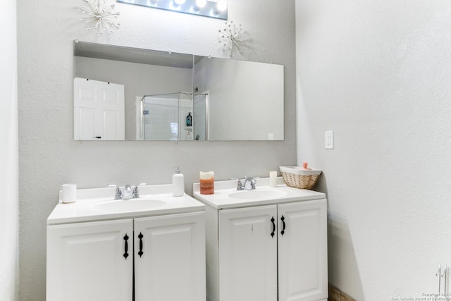 bathroom featuring vanity and walk in shower