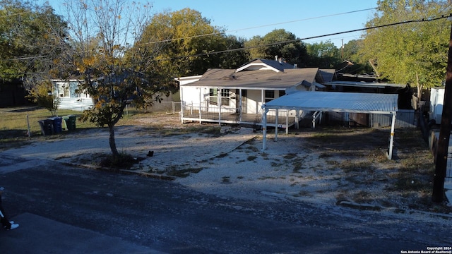 view of front of house featuring a carport