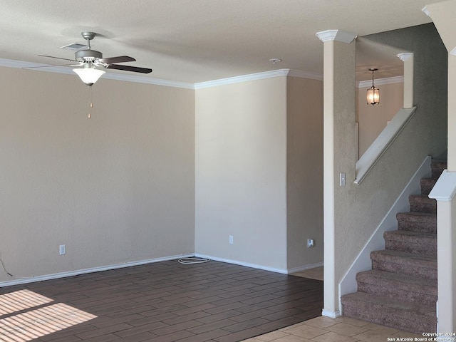 empty room with light hardwood / wood-style flooring, ceiling fan, and crown molding