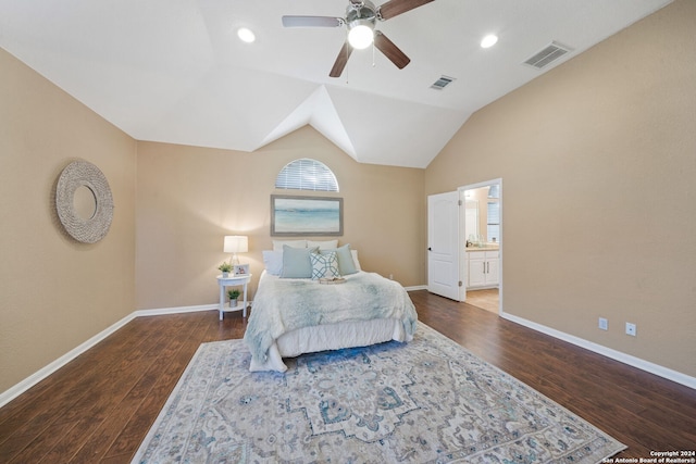 bedroom with ensuite bath, ceiling fan, dark hardwood / wood-style flooring, and lofted ceiling