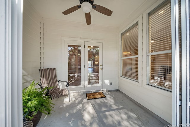 exterior space with ceiling fan