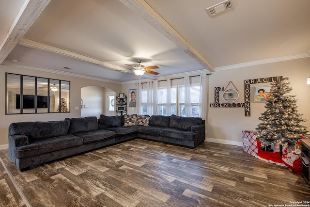 living room featuring beam ceiling, ceiling fan, dark hardwood / wood-style flooring, and crown molding