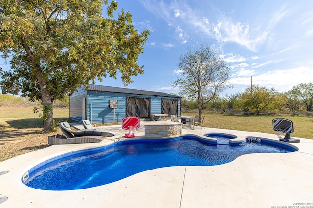 view of pool with a lawn, an outdoor structure, and a patio