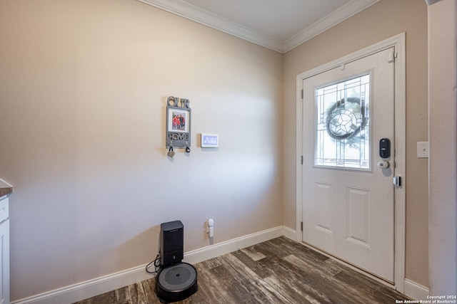 entrance foyer with dark hardwood / wood-style flooring and ornamental molding