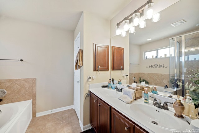 bathroom with vanity, tile patterned floors, and independent shower and bath