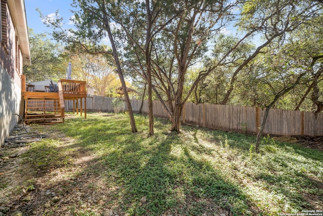 view of yard featuring a deck