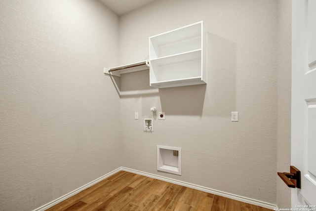 laundry room featuring hookup for an electric dryer, gas dryer hookup, hardwood / wood-style floors, and hookup for a washing machine