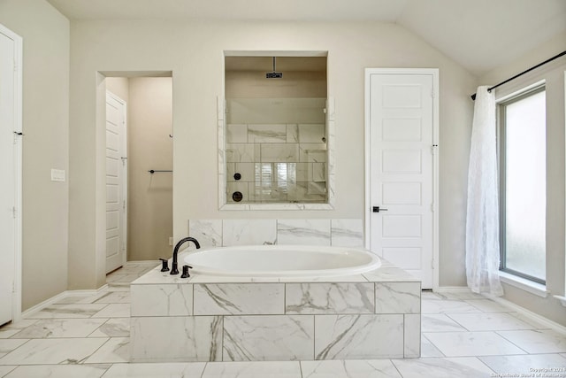 bathroom with independent shower and bath and vaulted ceiling