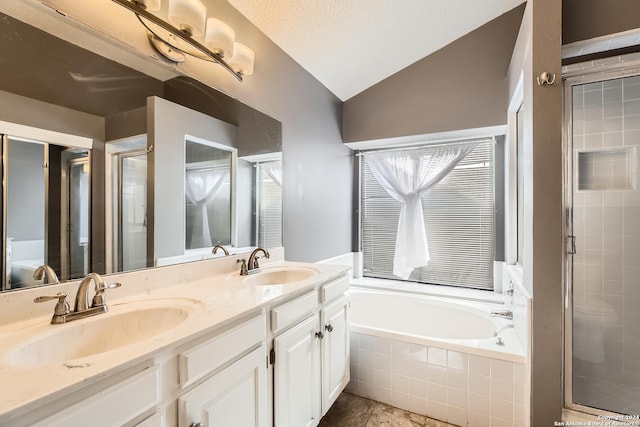 bathroom with vanity, plus walk in shower, and vaulted ceiling