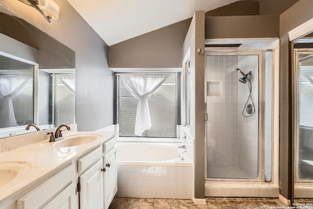 bathroom with vanity, lofted ceiling, and plus walk in shower