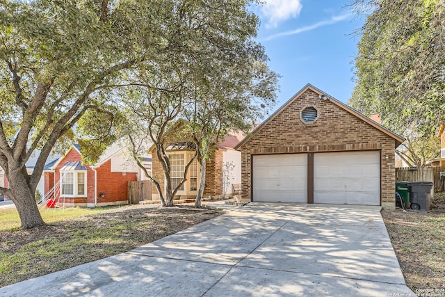 view of front property featuring a garage and an outdoor structure