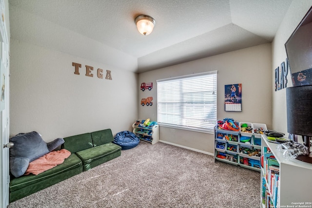 recreation room with carpet flooring and lofted ceiling