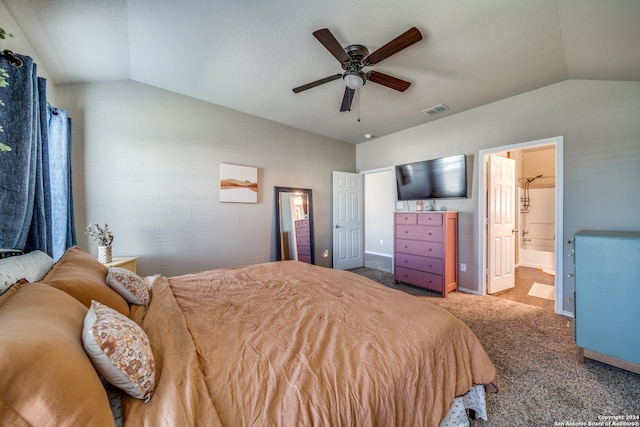 carpeted bedroom with connected bathroom, ceiling fan, and lofted ceiling