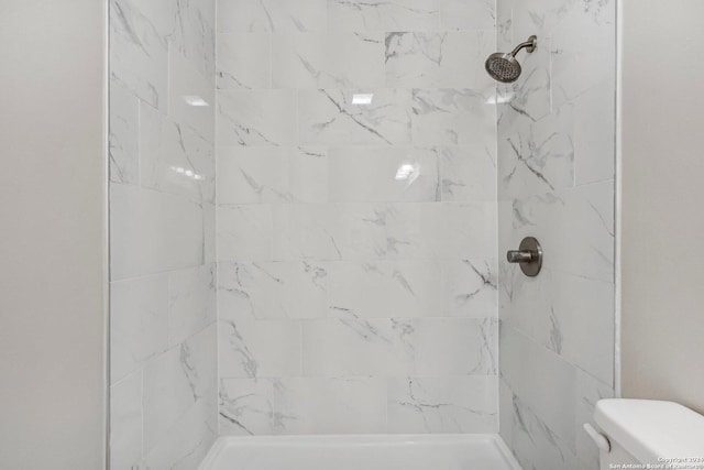4911 Dare, San Antonio, TX 78217 - bathroom with tiled shower and toilet
