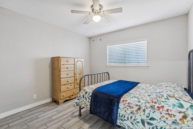 4911 Dare, San Antonio, TX 78217 - bedroom featuring light wood-type flooring and ceiling fan