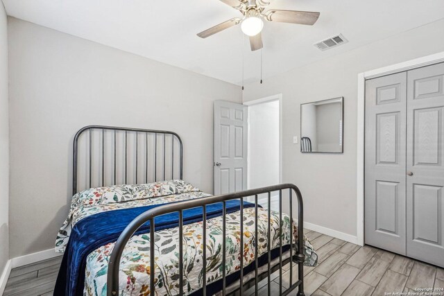 4911 Dare, San Antonio, TX 78217 - bedroom featuring light hardwood / wood-style floors, a closet, and ceiling fan