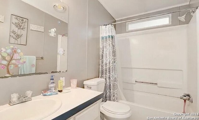 full bathroom featuring vanity, toilet, and shower / bathtub combination with curtain