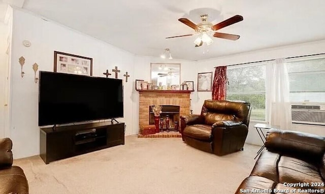 living room with carpet flooring, ceiling fan, cooling unit, and a fireplace