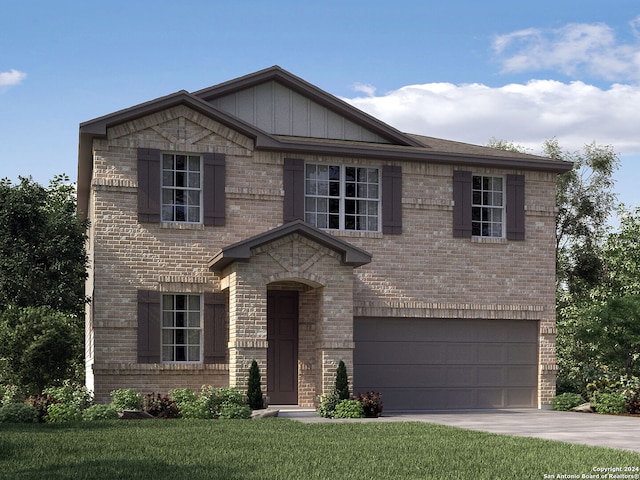 view of front facade with a front yard and a garage