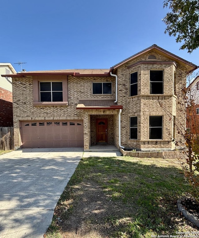 view of front of property featuring a garage