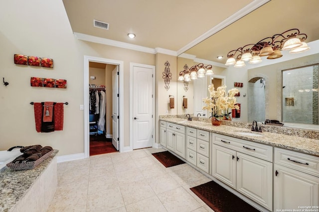 bathroom featuring tile patterned flooring, vanity, an enclosed shower, and ornamental molding