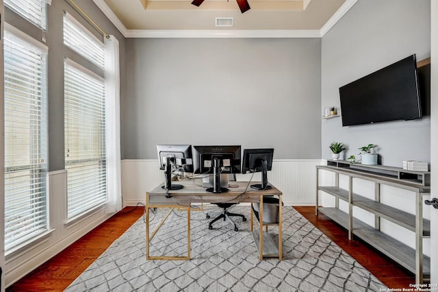 office area with dark hardwood / wood-style floors, ceiling fan, crown molding, and a wealth of natural light