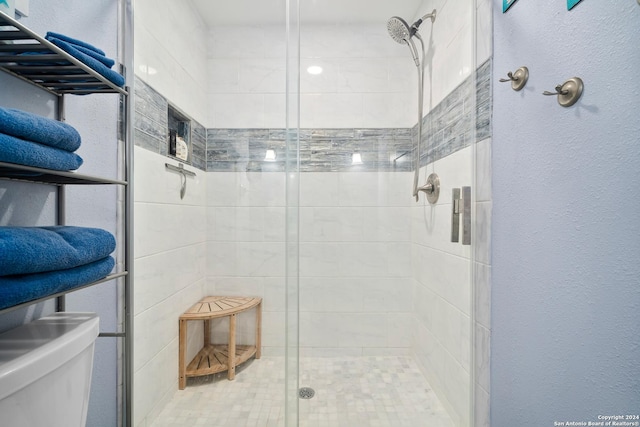 bathroom with an enclosed shower