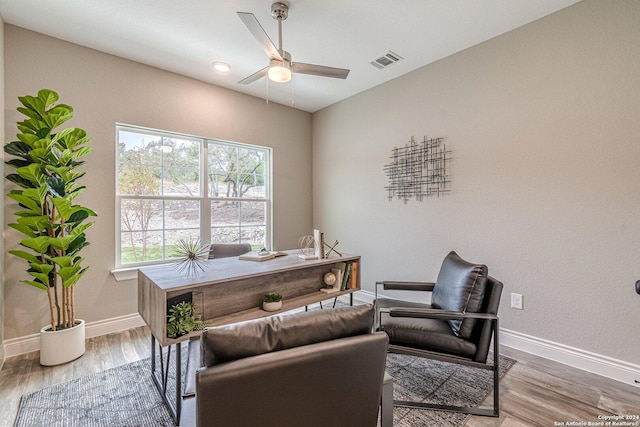 home office featuring ceiling fan and wood-type flooring