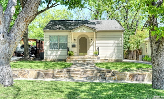333 Redwood St, Alamo Heights, TX 78209 - view of front of home with entry steps, an outbuilding, and crawl space