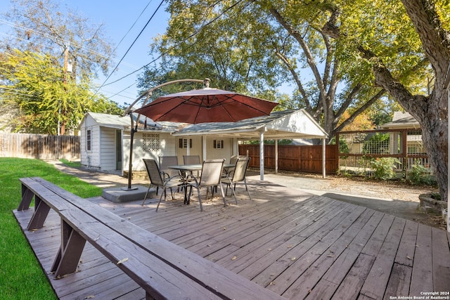 333 Redwood St, Alamo Heights, TX 78209 - deck featuring a fenced backyard, outdoor dining area, and an outbuilding