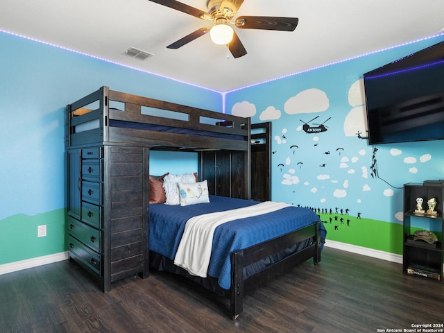 bedroom featuring dark hardwood / wood-style flooring and ceiling fan