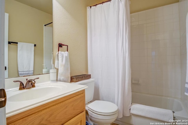 full bathroom with toilet, vanity, and shower / tub combo with curtain