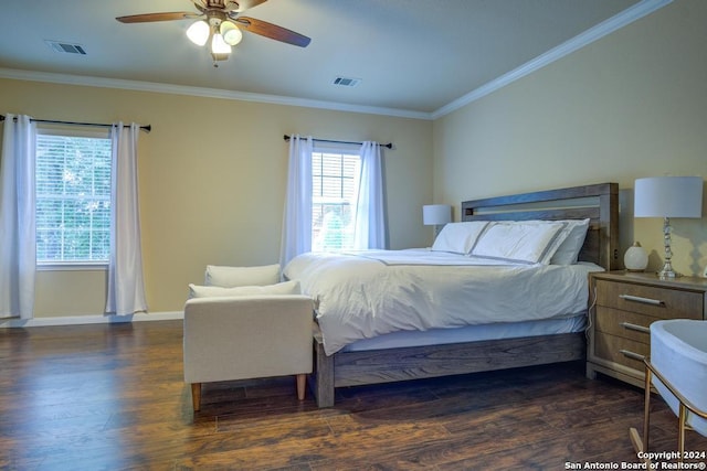 bedroom with ceiling fan, dark hardwood / wood-style flooring, and crown molding