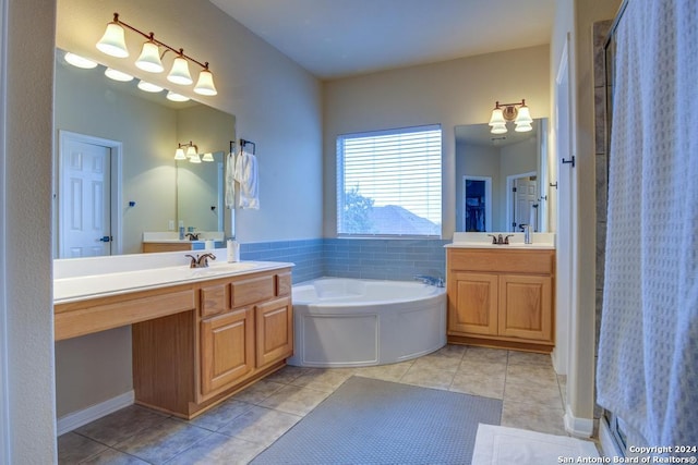 bathroom featuring tile patterned floors, vanity, and independent shower and bath