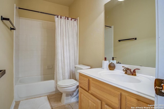 full bathroom featuring tile patterned flooring, vanity, shower / tub combo with curtain, and toilet