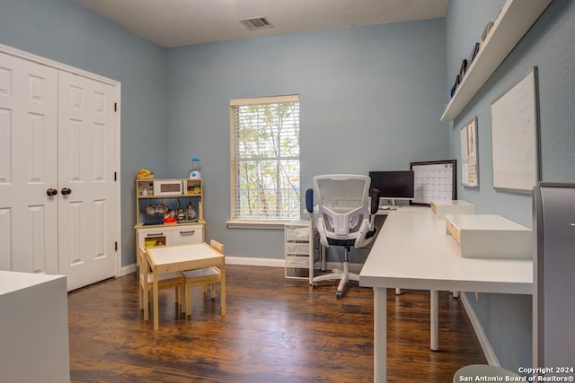 office with dark wood-type flooring