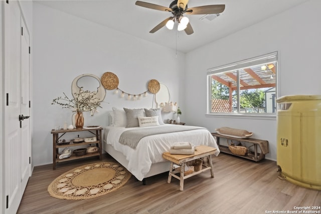 bedroom featuring ceiling fan and wood-type flooring