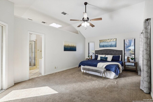 carpeted bedroom featuring connected bathroom, ceiling fan, and lofted ceiling