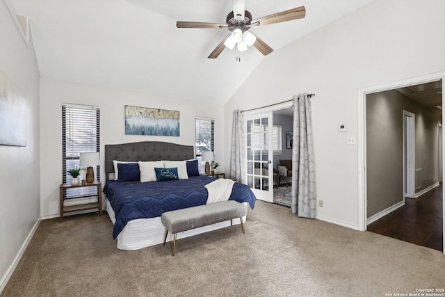 bedroom featuring dark colored carpet, ceiling fan, and vaulted ceiling