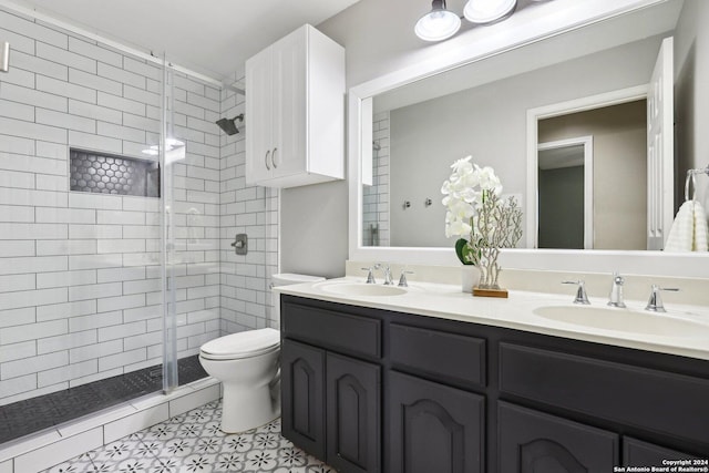 bathroom with vanity, toilet, and walk in shower