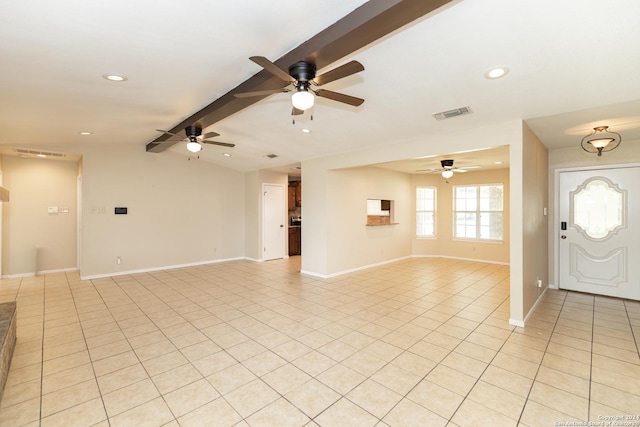 foyer featuring vaulted ceiling with beams, ceiling fan, and light tile patterned floors