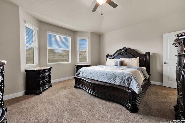 bedroom featuring light carpet and ceiling fan