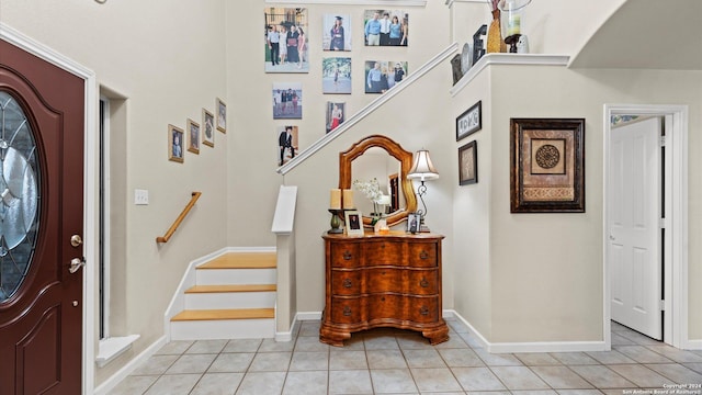 entryway featuring light tile patterned floors